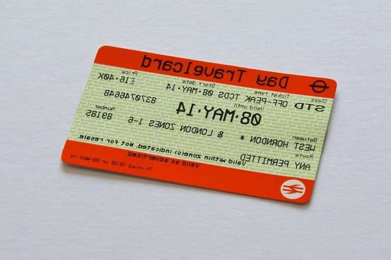 a-one-day-travelcard-is-shown-on-a-white-surface-with-the-words-off-peak