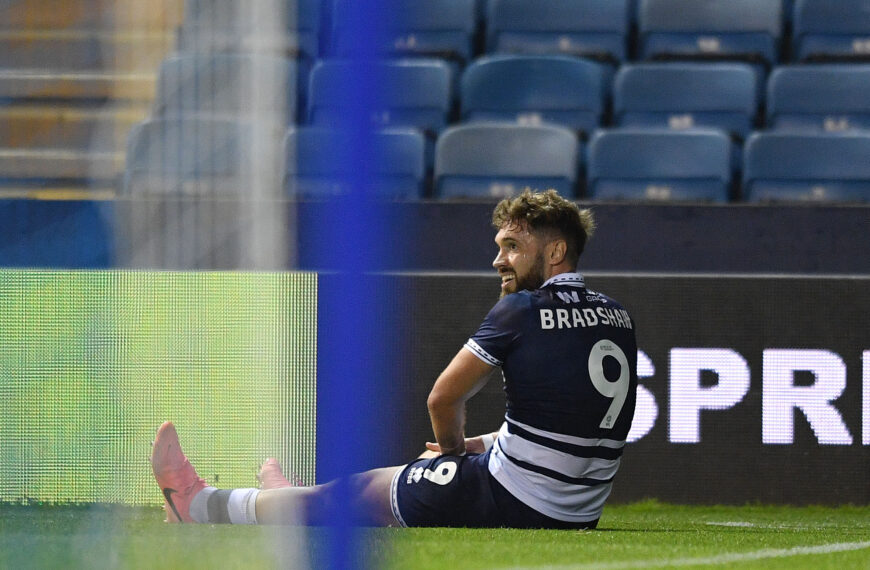 ‘It’s a bad one’ – Millwall boss facing striker shortage after Tom Bradshaw limps off in surprise EFL Cup defeat