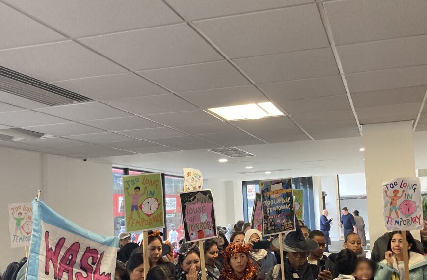 Protesters holding a sit-in Lewisham to demand officials rehouse two families